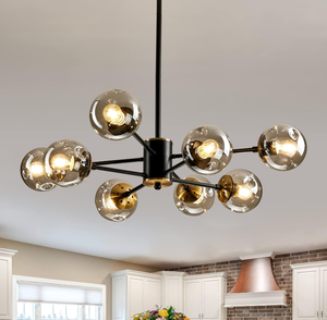 lot 81 image: Qgiytp 8-Light Glass Globe Sputnik Chandelier Matte Black and Gold Mid Century Modern Ceiling Light Fixture