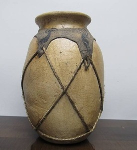 lot 28 image: Large Vintage African Pottery & Leather Jar