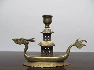 lot 77 image: Vintage Solid Brass Oriental Dragon Boat Candle Stand