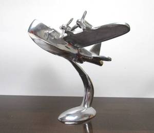 lot 100 image: Very Cool Chrome Airplane Display Sculpture