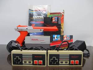 lot 131 image: Nintendo NES Video Game System wControllers Zapper & Cords