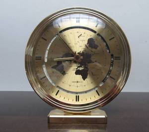 lot 146 image: Vintage Howard Miller Brass Desk World Clock