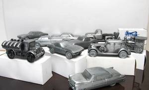 lot 227 image: Large Group of NOS Vintage Cast Metal Automobile Coin Banks