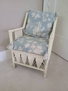 lot 32 image: Vintage White Wicker Armchair with Blue Floral Cushions