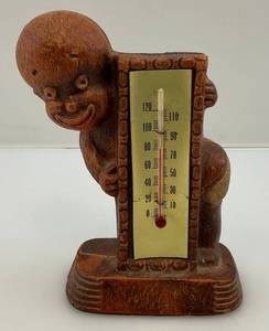lot 17 image: Vintae 1949 Multi Products Inc. Chalkware Thermometer Figurine, Child Child With Sign