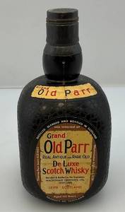 lot 55 image: Vintage Grand Old Parr De Luxe Scotch Whisky Bottle Transistor Radio. (Needs New Battery Box)