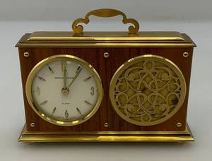 lot 76 image: Vintage Remembrance 8 Day Alarm Music Box Clock Swiss Made ( Non Working)