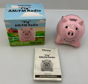 lot 101 image: Vintage Little Pink Pig Transistor Radio (WORKS)