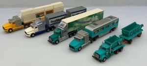 lot 106 image: Misc. Miniature Advertisement Toy Semi Trucks