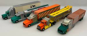 lot 107 image: Misc. Miniature Advertisement Toy Semi Trucks