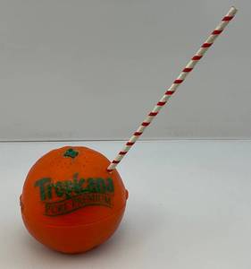 lot 112 image: Vintage Tropicana Pure Premium Transistor Radio (WORKS)