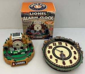 lot 132 image: Two Vintage Lionel Trains Animated Clocks 1 (NIB) (BOTH WORK)
