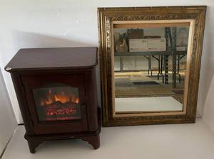 lot 148 image: Electric FireplaceHeater Cabinet (WORKS) And Ornate Framed Mirror 30 x 36