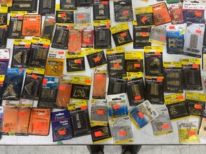 TABLE FULL OF 250 BRASS ITEMS