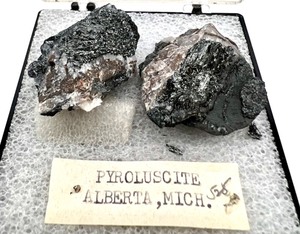 lot 62 image: Natural PYROLUSCITE Rocks In case, ALBERTA, MICH