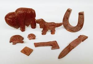 lot 261 image: Collection of Hand-Carved Red Rock Figurines