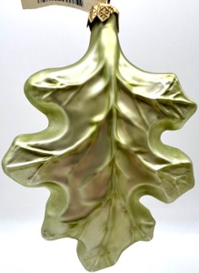 lot 280 image: MARTHA STEWART COLLECTION Green Leaf Ornament with Red & Gold Unmarked Leaf Ornament