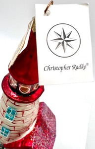 lot 290 image: Vintage CHRISTOPHER RADKO Lighthouse with Tag Ornament
