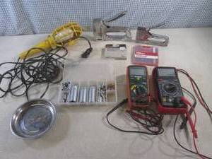 lot 77 image: (A-2) 2 Volt Meters, 12V Work Light, 2 Staple Guns with Box of Staples, Sockets Etc
