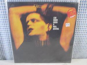 lot 109 image: (FS) 1974 Lou Reed Rock N Roll Animal Album - Jacket and Record Individually Sleeved with Record On Outside of Jacket