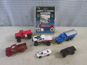 lot 175 image: (CS) Miniature Radio Flyer Wagon and Toy TrucksCar