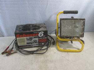 lot 272 image: (EC1) Schauer 6 Amp Battery Charger and Work Light