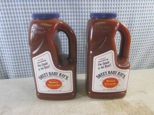 lot 299 image: (B-2) 2 - 2 Qt Bottles Sweet Baby Rays Honey Sriracha Wing Sauce & Glaze 64oz Best by Jan 2024
