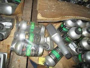 lot 500 image: Large lot of assorted automotive fluids including lubricant and rust preventer, oil system treatment, regular friction modifier