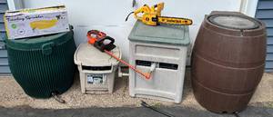 lot 14 image: Grass Care Assortment- Rain Barrels, Traveling Sprinkler, Hoses, Hose Reels, Electric Chainsaw and Black & Decker Hedge Trimmer