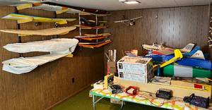 lot 47 image: Massive RC Gas Powered Airplanes, radio control systems, wings, parts, blueprints, accessories and more