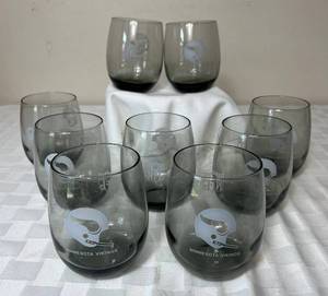 lot 57 image: Minnesota Vikings NFL Vintage 1970s Smoke Gray Tumbler Rocks Glasses  - set of 9