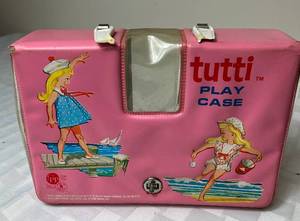 lot 62 image: Vintage Mattel Barbie Tutti Pink Play Case with 5 Tutti and friends dolls, clothing and accessories