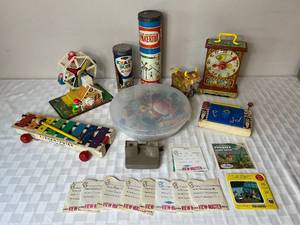 lot 66 image: Vintage Toy Collection Fisher Price Toys, Tinkertoys, Viewmaster & Reels, Wood Blocks, Magnetic Letters and Krazy Ikes