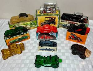 lot 103 image: Vintage Avon Glass Vehicle After Shave Bottles
