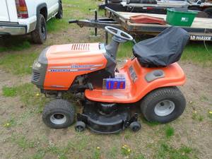 Husquvarna 1542 hydro lawn tractor. Twin Kawasaki. Used condition. Tested & works. New battery. As shown.