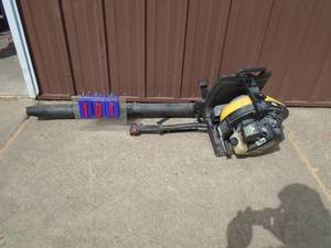 McCullough 2 cycle backpack blower. Used condition. Ran on ether. As shown.