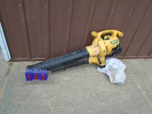Yardman blower vac. Gas powered. Used condition. Consignor states it was running but not used this year. As shown.