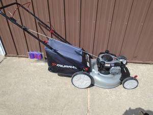 Murray push mower with bagger. Very nice condition. Tested & works. As shown.