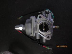lot 169 image: small gas engine new carb....