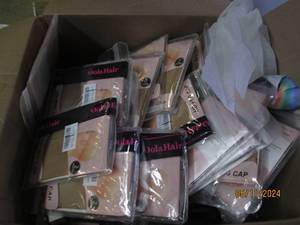 lot 136 image: box of wig caps...
