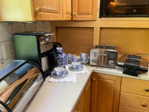lot 273 image: Krups Coffee, Cruisinart Toaster, Breadbox, Waffle Makers & Blue Dishes