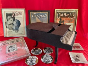 lot 328 image: Framed Sheet Music Pictures & Piano Prop