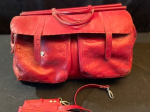 lot 50 image: JL Saldivar Red Leather Travel Bag With Many Pockets & Zippers