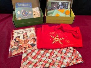 lot 342 image: American Girl Outfit for Daughter (small 78) , Book, and Solar System & Bug Activities