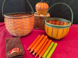 lot 55 image: Pumpkin & Fall Longaberger Basket Collection with Inserts & Party Lite Tapers