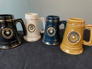 lot 400 image: Four Illinois Wesleyan College Mugs