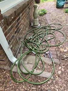lot 144 image: Outdoor Collection of Hose, Bird Bath Base and Cement Stone
