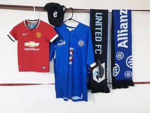 lot 36 image: Soccer Jerseys and Scarfs