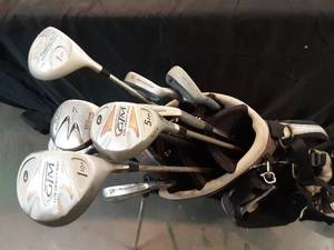 lot 63 image: Ogio Golf Bag with Assorted Clubs, GTM, Wilson,Northwes