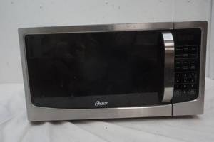 lot 76 image: Black Oster Microwave